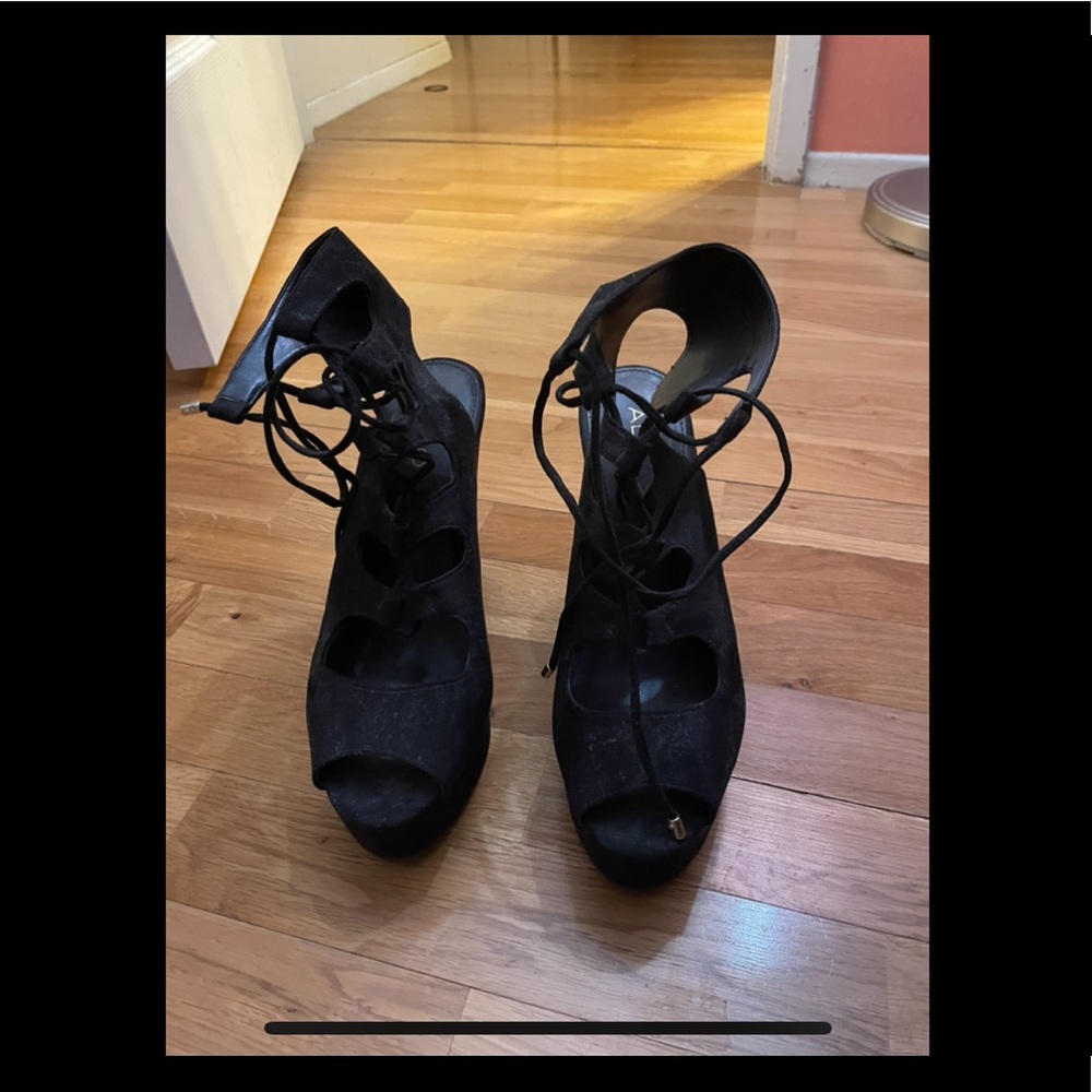 Never worn Aldo lace up black wedges